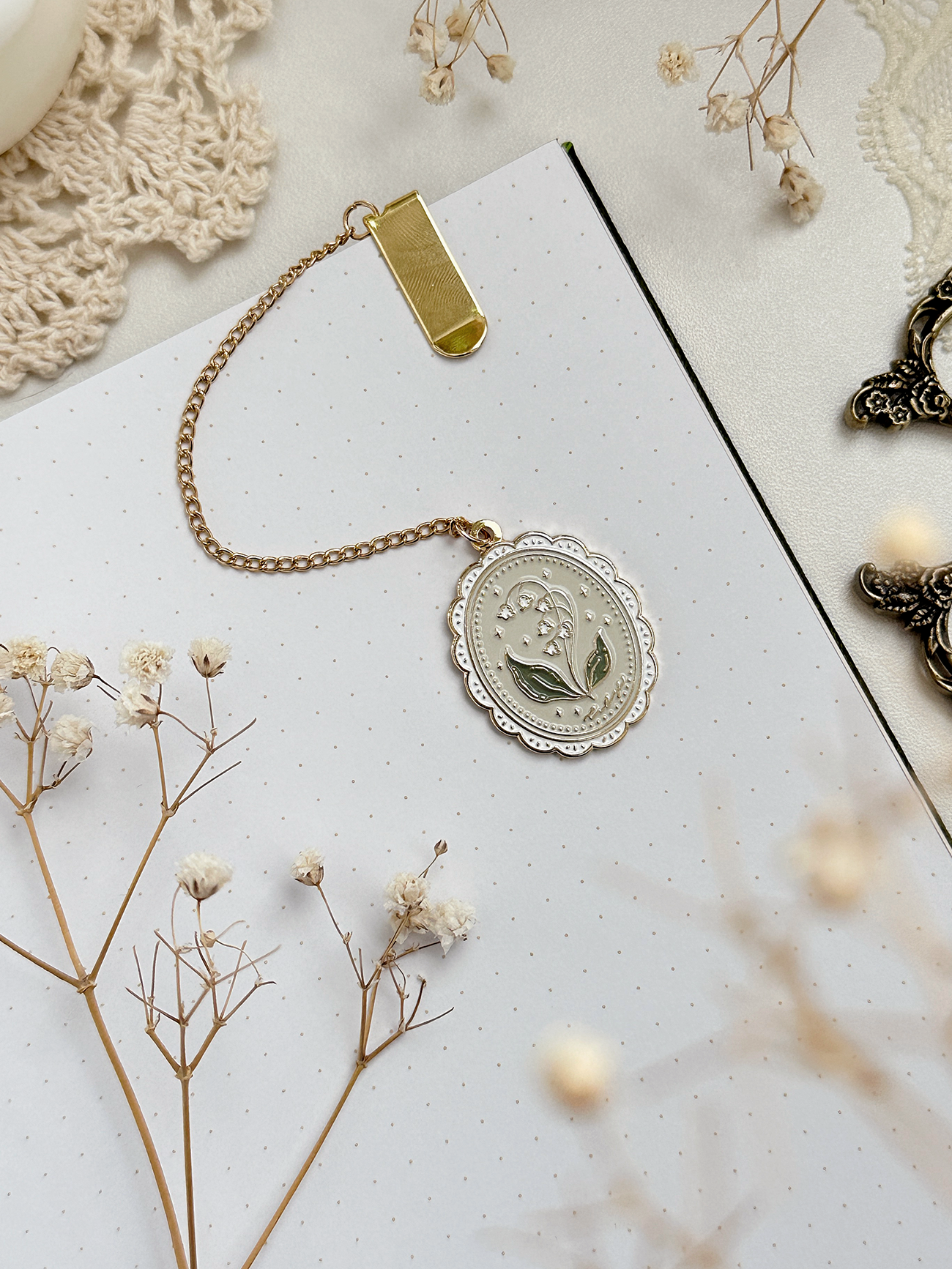 framed lily of the valley enamel bookmark pendant