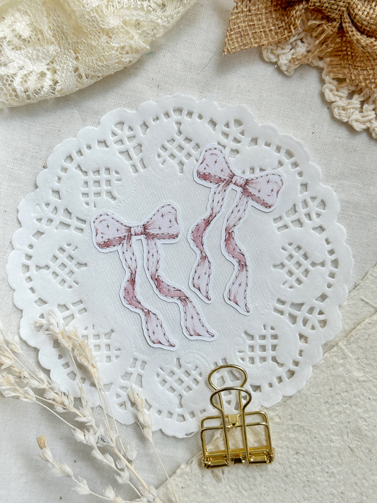 pink bow sticker flake 1.25x1.75